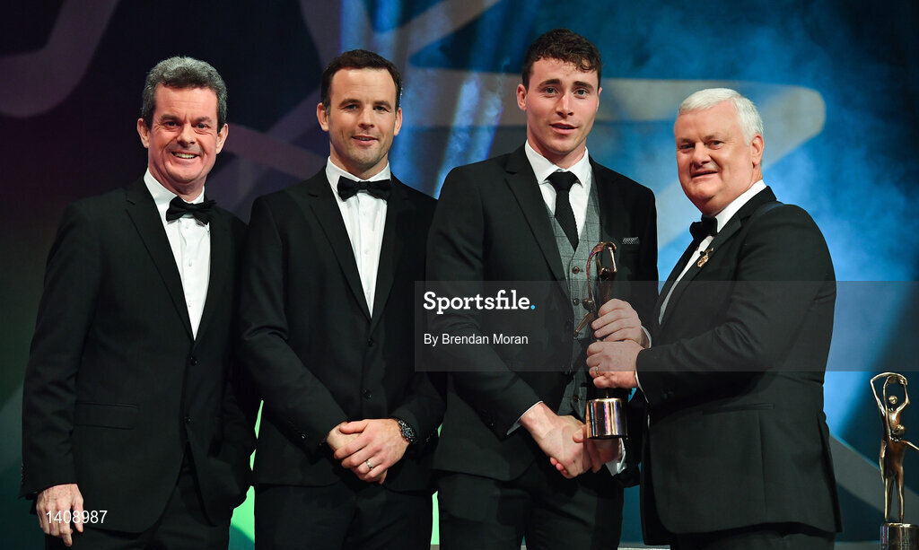 3 November 2017; Galway hurler Conor Cooney is presented with his PwC All Star award from Uachtarán Chumann Lúthchleas Gael Aogán Ó Fearghail, in the company of Feargal O'Rourke, left, Managing Partner, PwC, and David Collins, GPA President during the PwC All Stars 2017 at the Convention Centre in Dublin. Photo by Brendan Moran/Sportsfile