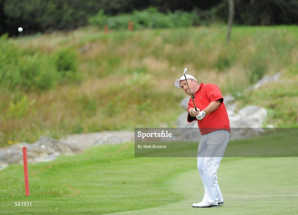 30 July 2011; Damien McGrane pitches onto the 4th green during the third round of the 2011 Discover Ireland Irish Open Golf Championship, Killarney Golf & Fishing Club, Killarney, Co. Kerry. Picture credit: Matt Browne / SPORTSFILE