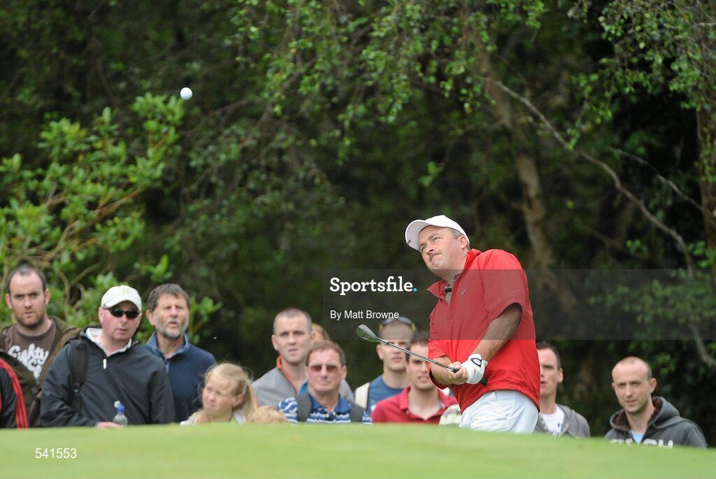 30 July 2011; Damien McGrane pitches onto the second green during the third round of the 2011 Discover Ireland Irish Open Golf Championship, Killarney Golf & Fishing Club, Killarney, Co. Kerry. Picture credit: Matt Browne / SPORTSFILE