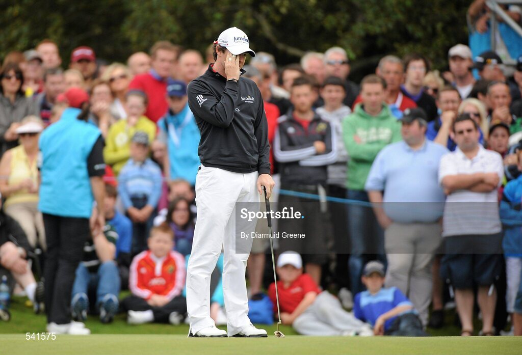 30 July 2011; Rory McIlroy reacts after missing a par putt on the 3rd during the third round of the 2011 Discover Ireland Irish Open Golf Championship, Killarney Golf & Fishing Club, Killarney, Co. Kerry. Picture credit: Diarmuid Greene / SPORTSFILE
