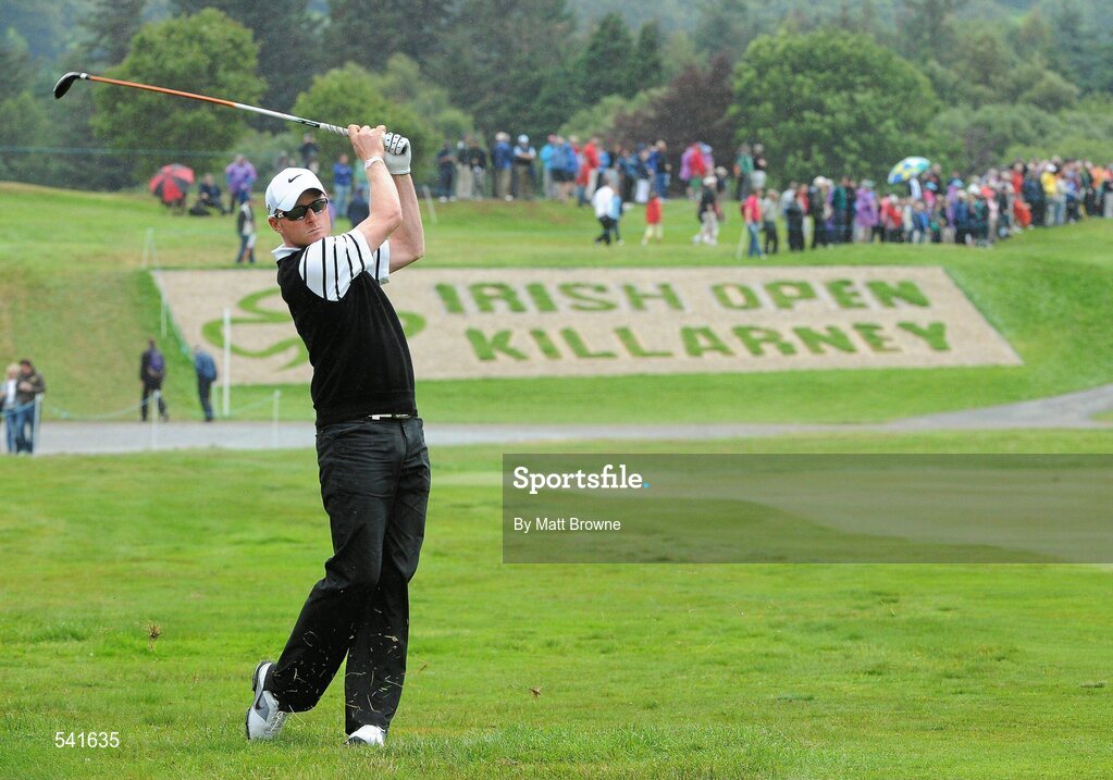 30 July 2011; Simon Dyson watches his second shot to the 18th green during the third round of the 2011 Discover Ireland Irish Open Golf Championship, Killarney Golf & Fishing Club, Killarney, Co. Kerry. Picture credit: Matt Browne / SPORTSFILE
