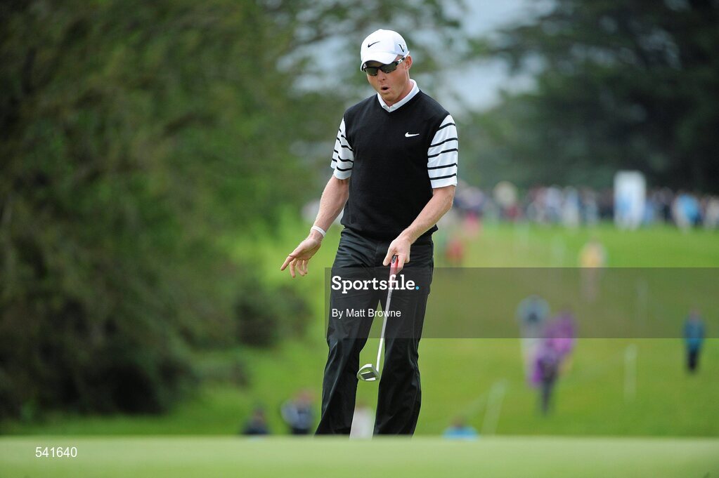 30 July 2011; Simon Dyson watches his birdie putt on the 17th green during the third round of the 2011 Discover Ireland Irish Open Golf Championship, Killarney Golf & Fishing Club, Killarney, Co. Kerry. Picture credit: Matt Browne / SPORTSFILE