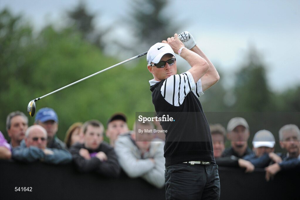 30 July 2011; Simon Dyson watches his tee shot from the 18th during the third round of the 2011 Discover Ireland Irish Open Golf Championship, Killarney Golf & Fishing Club, Killarney, Co. Kerry. Picture credit: Matt Browne / SPORTSFILE