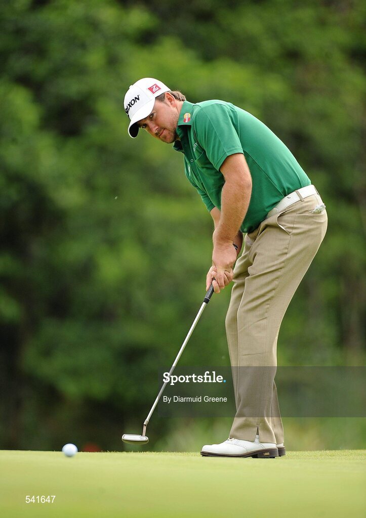 30 July 2011; Graeme McDowell putts on the 6th green during the third round of the 2011 Discover Ireland Irish Open Golf Championship, Killarney Golf & Fishing Club, Killarney, Co. Kerry. Picture credit: Diarmuid Greene / SPORTSFILE