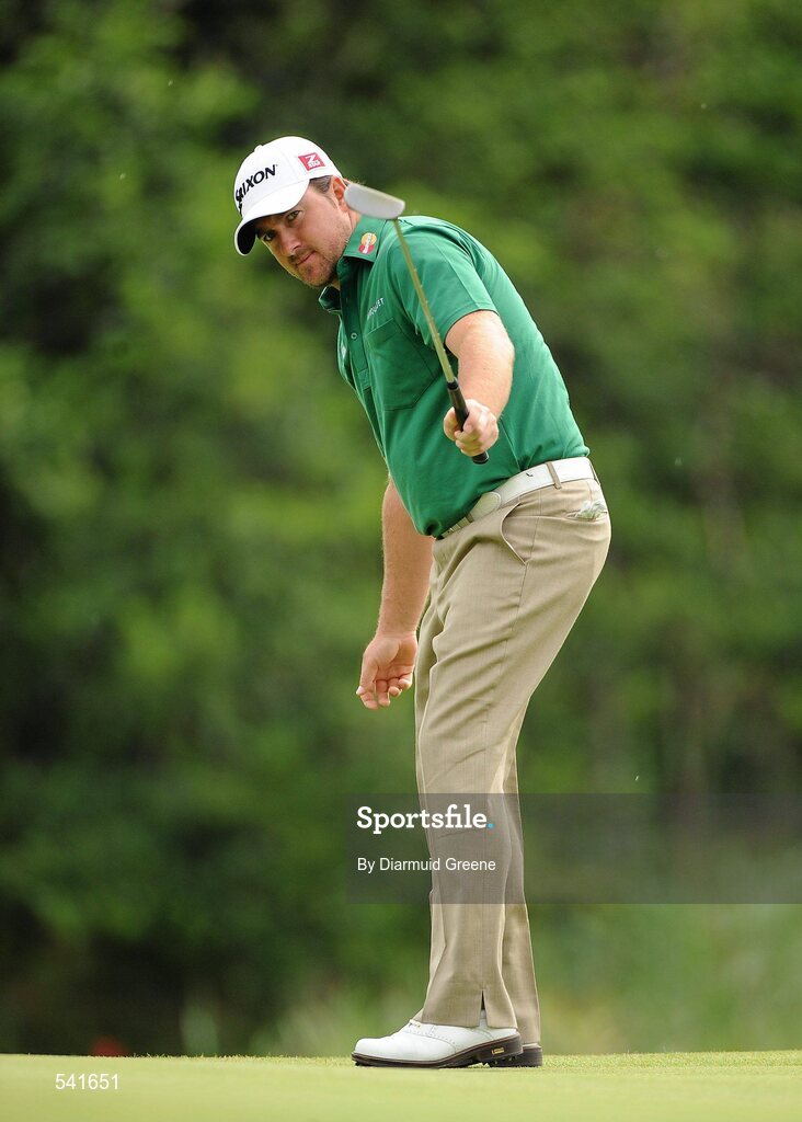 30 July 2011; Graeme McDowell urges his putt on at the 6th green during the third round of the 2011 Discover Ireland Irish Open Golf Championship, Killarney Golf & Fishing Club, Killarney, Co. Kerry. Picture credit: Diarmuid Greene / SPORTSFILE