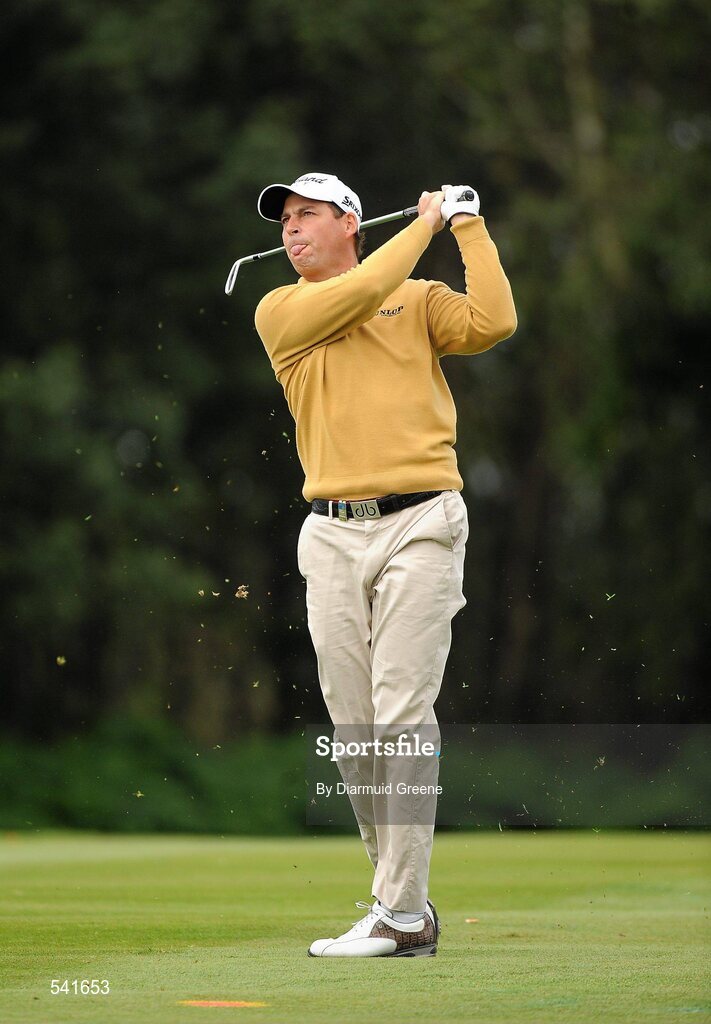 30 July 2011; David Howell watches his approach shot to the 4th green during the third round of the 2011 Discover Ireland Irish Open Golf Championship, Killarney Golf & Fishing Club, Killarney, Co. Kerry. Picture credit: Diarmuid Greene / SPORTSFILE