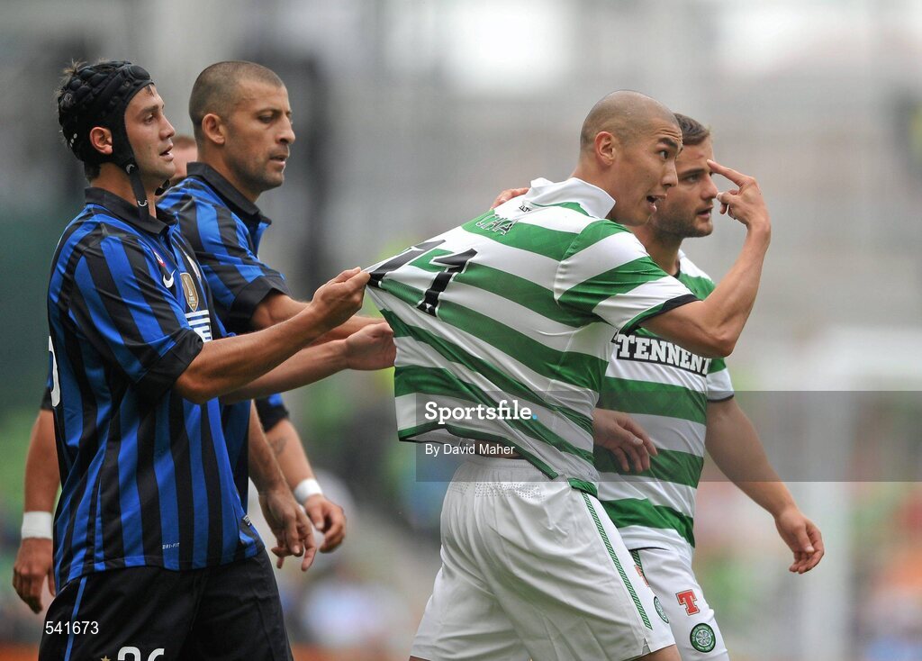 30 July 2011; Christian Chivu, Inter Milan, pulls the jersey of Cha Du Ri, Glasgow Celtic FC. Dublin Super Cup, Inter Milan v Glasgow Celtic FC, Aviva Stadium, Lansdowne Road, Dublin. Picture credit: David Maher / SPORTSFILE