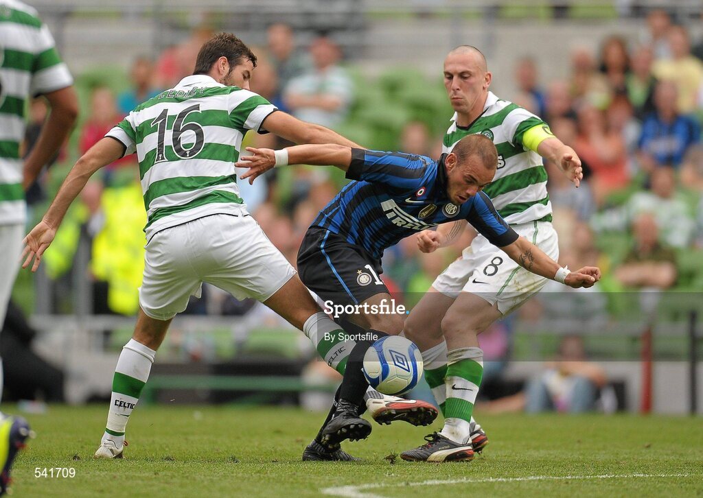 30 July 2011; Wesley Sneijder, Inter Milan, in action against Joe Ledley, left, and Scott Brown, Glasgow Celtic FC. Dublin Super Cup, Inter Milan v Glasgow Celtic FC, Aviva Stadium, Lansdowne Road, Dublin. Photo by Sportsfile