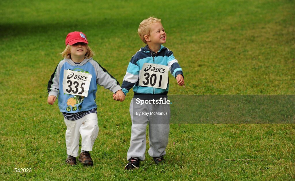 31 July 2011; Freddie Walsh, three years, from Ballon, Co Carlow, and his cousin Rory Mitten, 3, from Newbridge, Co Kildare, arrive for the Athletics Ireland Family Fitness Festival at Farmleigh. Phoenix Park, Dublin. Picture credit: Ray McManus / SPORTSFILE