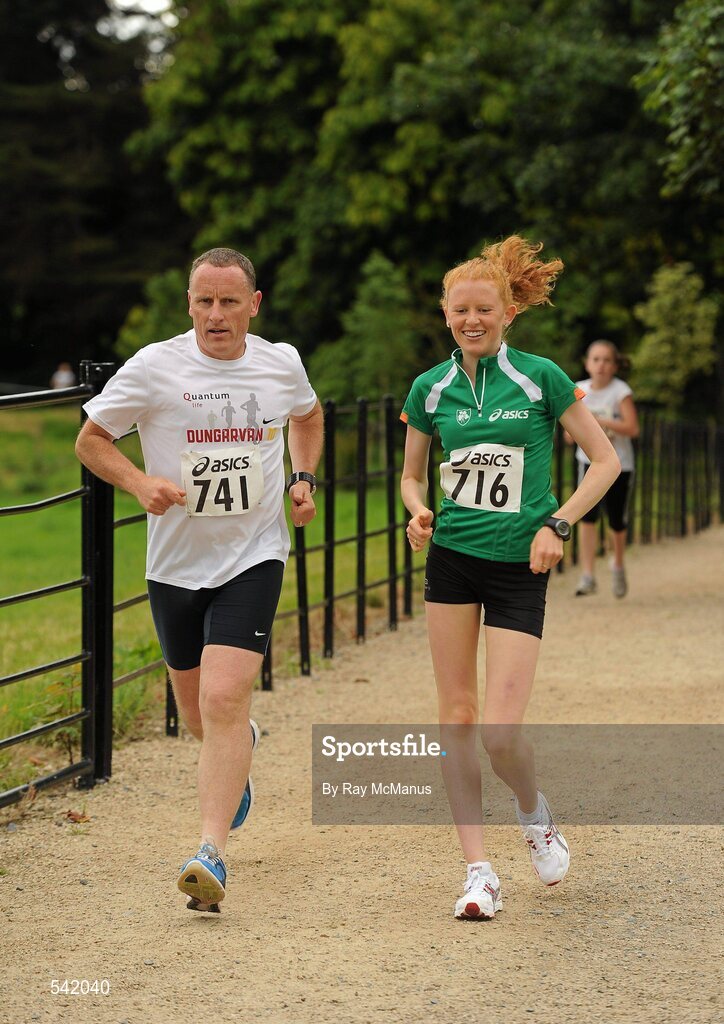 31 July 2011; Ireland's Kate Veale, Gold Medallist in the Girls 5000m Walk, with her dad James in action during Athletics Ireland Family Fitness Festival at Farmleigh. Phoenix Park, Dublin. Picture credit: Ray McManus / SPORTSFILE