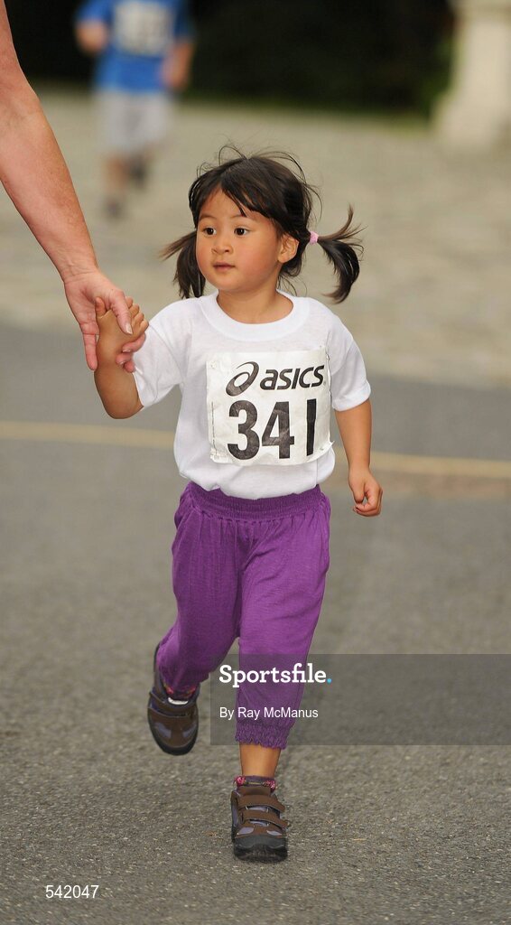 31 July 2011; Three year old Victorine Tám Thomas, from Clondalkin, Dublin, in action during Athletics Ireland Family Fitness Festival at Farmleigh. Phoenix Park, Dublin. Picture credit: Ray McManus / SPORTSFILE