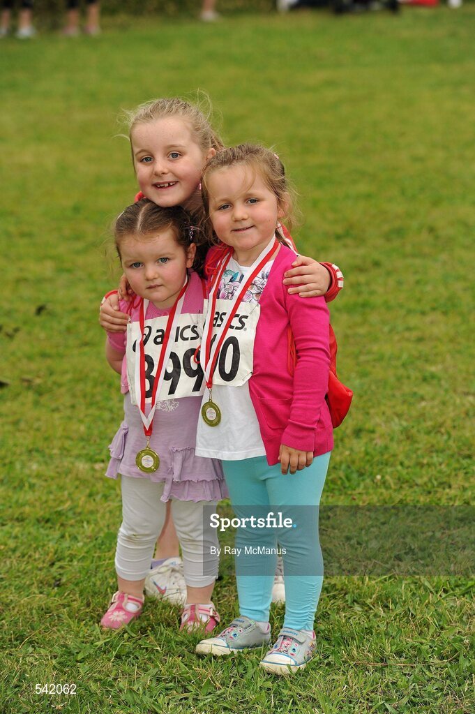 31 July 2011; Sister Ailbhe, two years, Tara, 4, and Shauna Mooney, from Leixlip, after the Athletics Ireland Family Fitness Festival at Farmleigh. Phoenix Park, Dublin. Picture credit: Ray McManus / SPORTSFILE