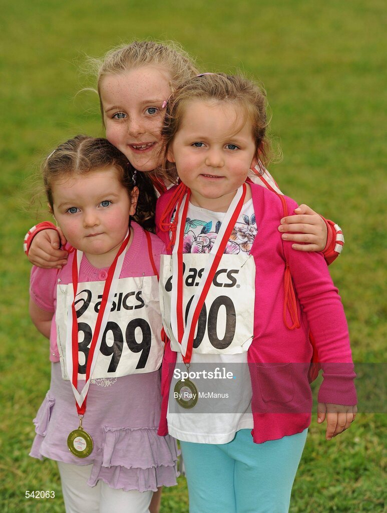 31 July 2011; Sister Ailbhe, two years, Tara, 4, and Shauna Mooney, from Leixlip, after the Athletics Ireland Family Fitness Festival at Farmleigh. Phoenix Park, Dublin. Picture credit: Ray McManus / SPORTSFILE