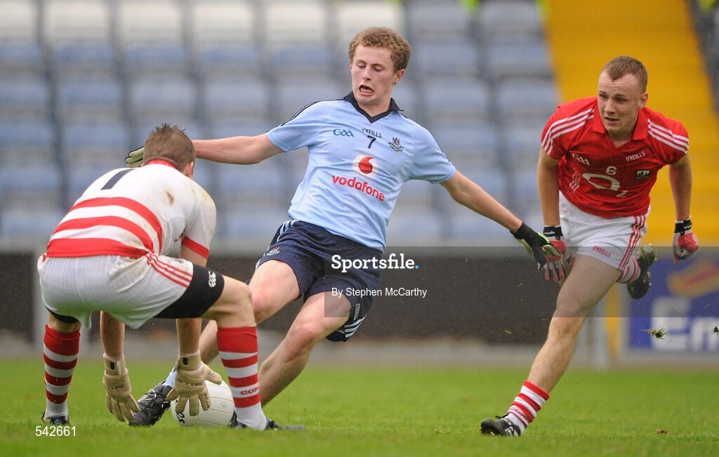 1 August 2011; Jack McCaffrey, Dublin, in action against James McDonnell, left, and Brian O'Driscoll, Cork. GAA Football All-Ireland Minor Championship Quarter-Final, Dublin v Cork, O'Moore Park, Portlaoise, Co. Laois. Picture credit: Stephen McCarthy / SPORTSFILE