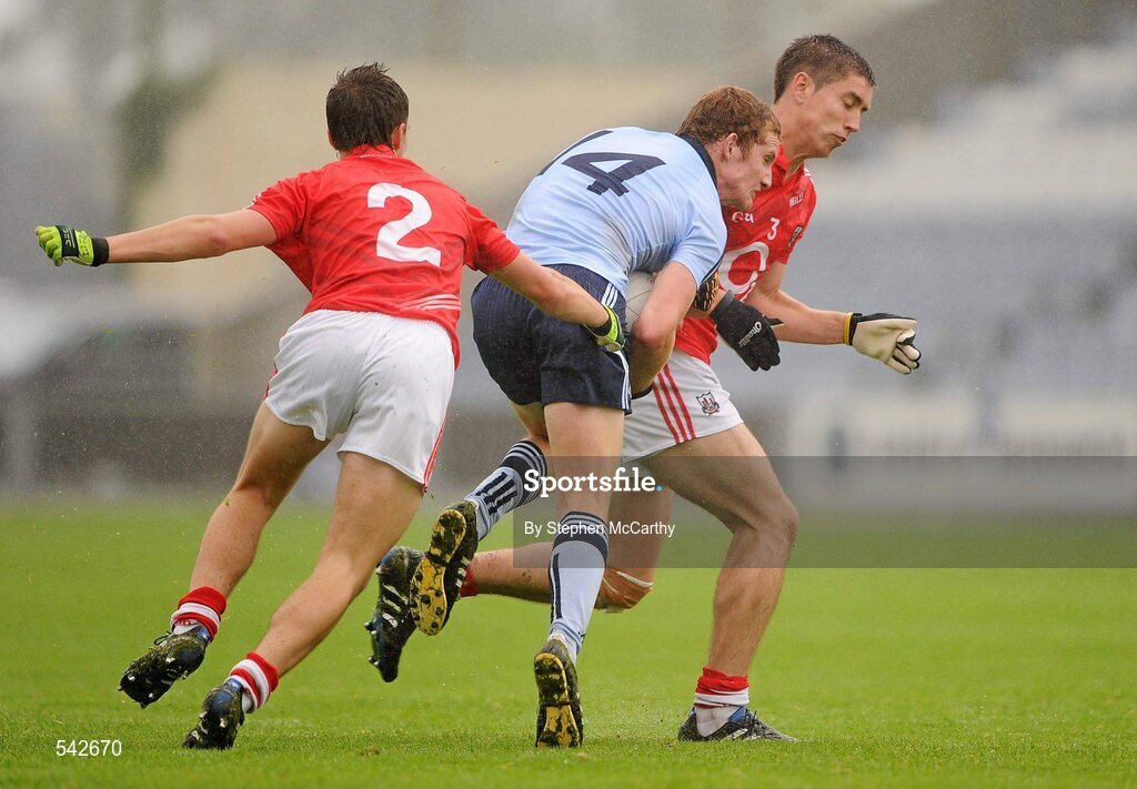1 August 2011; Ciaran Kilkenny, Dublin, in action against Jamie Davis, left, and Conor Dorman, Cork. GAA Football All-Ireland Minor Championship Quarter-Final, Dublin v Cork, O'Moore Park, Portlaoise, Co. Laois. Picture credit: Stephen McCarthy / SPORTSFILE