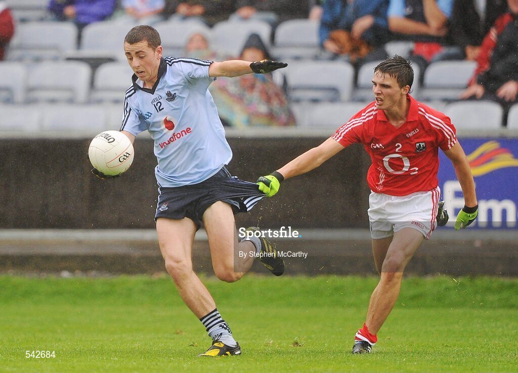 1 August 2011; Cormac Costello, Dublin, has his shorts pulled at by Jamie Davis, Cork. GAA Football All-Ireland Minor Championship Quarter-Final, Dublin v Cork, O'Moore Park, Portlaoise, Co. Laois. Picture credit: Stephen McCarthy / SPORTSFILE