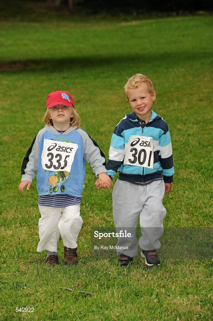 31 July 2011; Freddie Walsh, three years, from Ballon, Co. Carlow, and his cousin Rory Mitten, 3, from Newbridge, Co. Kildare, arrive for the Athletics Ireland Family Fitness Festival at Farmleigh. Phoenix Park, Dublin. Picture credit: Ray McManus / SPORTSFILE