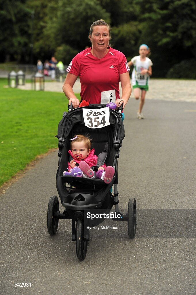31 July 2011; Tara and Rebecca Monks, Glasnevin, Dublin, in action during the Athletics Ireland Family Fitness Festival at Farmleigh. Phoenix Park, Dublin. Picture credit: Ray McManus / SPORTSFILE