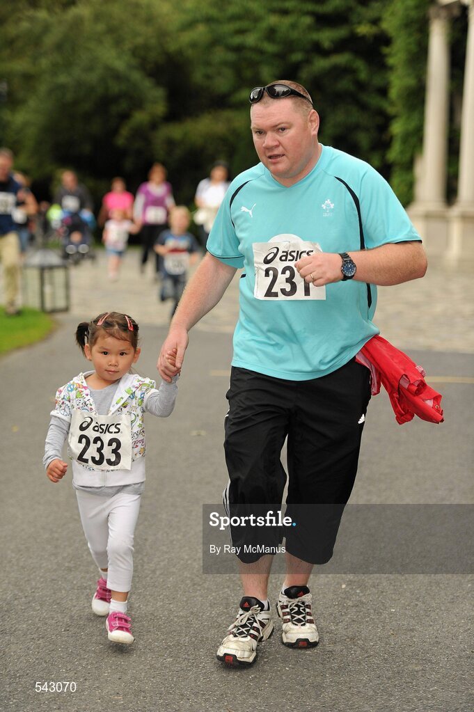 31 July 2011; Martin and three year old Afric Martin, Ashbourne, Co. Meath, in action during the Athletics Ireland Family Fitness Festival at Farmleigh. Phoenix Park, Dublin. Picture credit: Ray McManus / SPORTSFILE