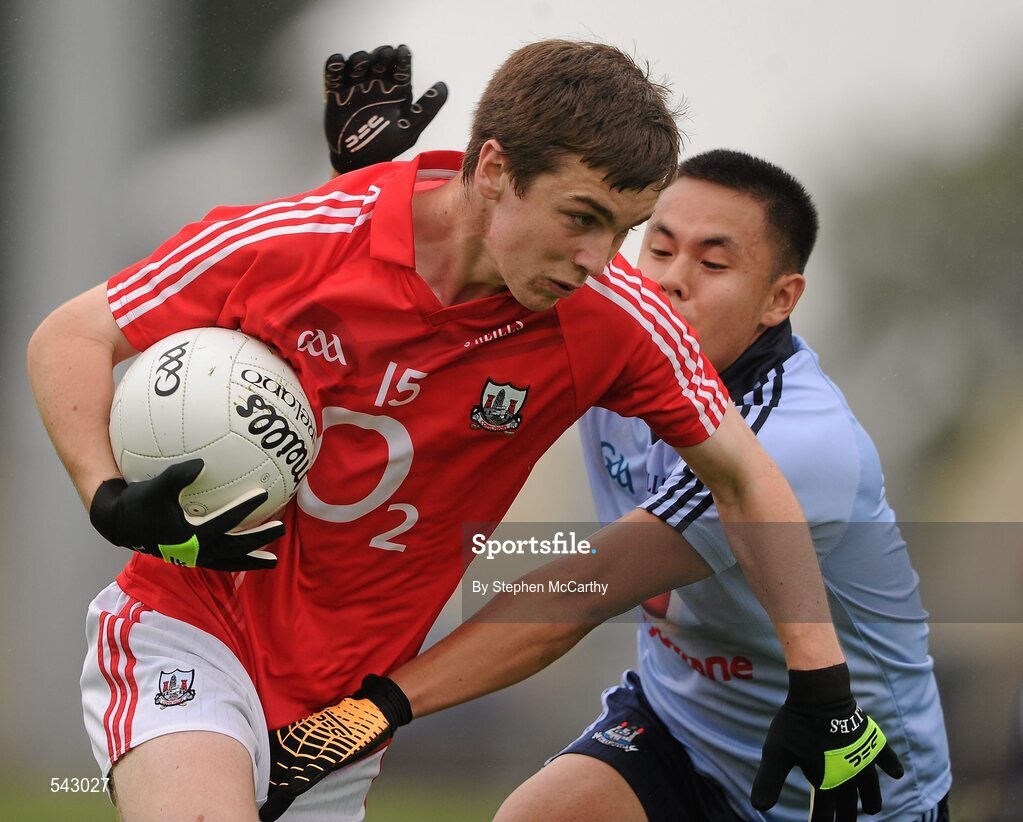 1 August 2011; David Harrington, Cork, is tackled by Rutherson Real, Dublin. GAA Football All-Ireland Minor Championship Quarter-Final, Dublin v Cork, O'Moore Park, Portlaoise, Co. Laois. Picture credit: Stephen McCarthy / SPORTSFILE