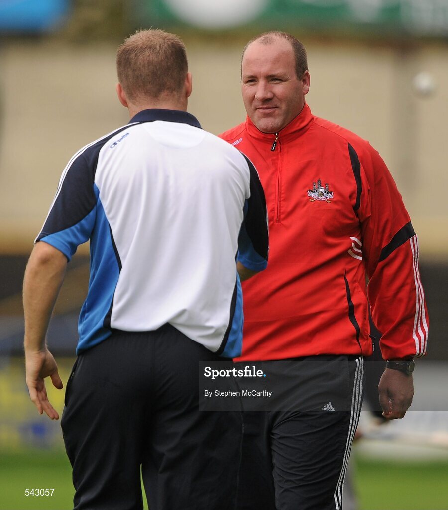 1 August 2011; Cork manager Brian Cuthbert shakes hands with Dublin manager Dessie Farrell after the match. GAA Football All-Ireland Minor Championship Quarter-Final, Dublin v Cork, O'Moore Park, Portlaoise, Co. Laois. Picture credit: Stephen McCarthy / SPORTSFILE