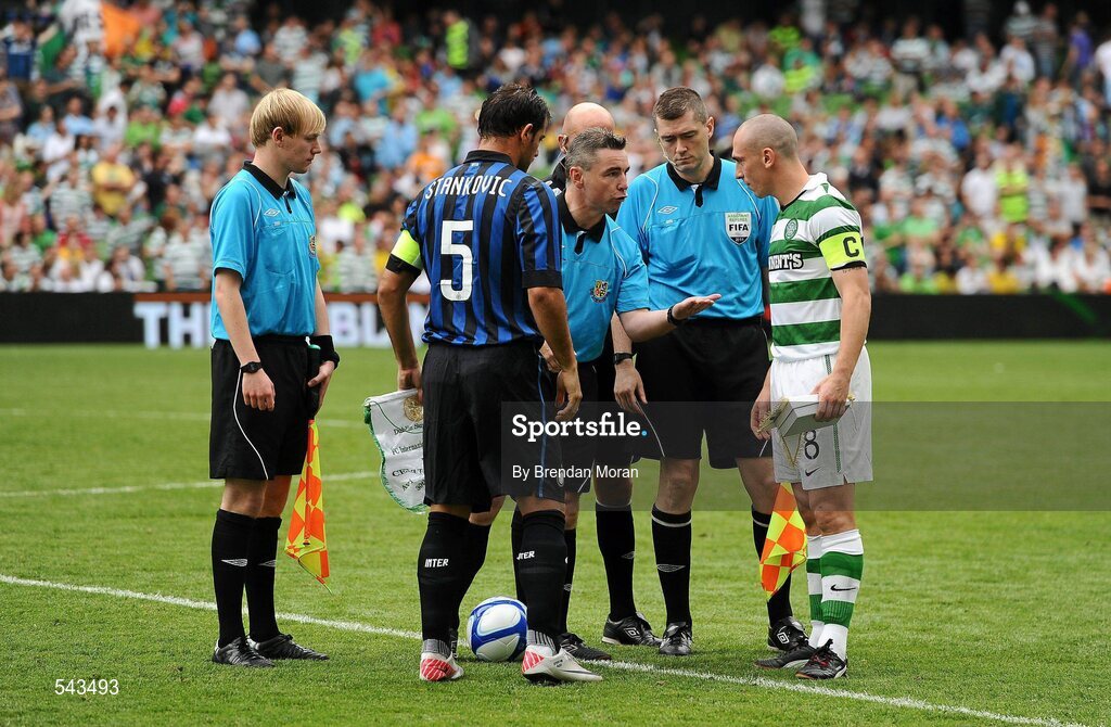 30 July 2011; Referee Damien Hancock makes the coin toss between Dejan Stankovic, Inter Milan, and Scott Brown, Glasgow Celtic FC. Dublin Super Cup, Inter Milan v Glasgow Celtic FC, Aviva Stadium, Lansdowne Road, Dublin. Picture credit: Brendan Moran / SPORTSFILE