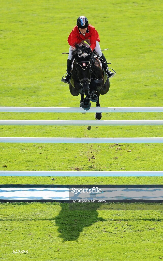 4 August 2011; Beezi Madden, USA, competing on Cortes 'C', during the Power & Speed Event. Dublin Horse Show 2011, RDS, Ballsbridge, Dublin. Picture credit: Stephen McCarthy / SPORTSFILE