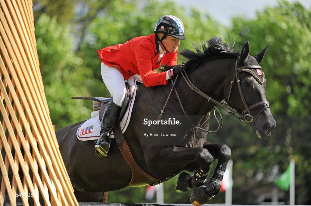 4 August 2011; Beezie Madden, USA, competing on Cortes 'C', during the Power & Speed Event. Dublin Horse Show 2011, RDS, Ballsbridge, Dublin. Picture credit: Brian Lawless / SPORTSFILE
