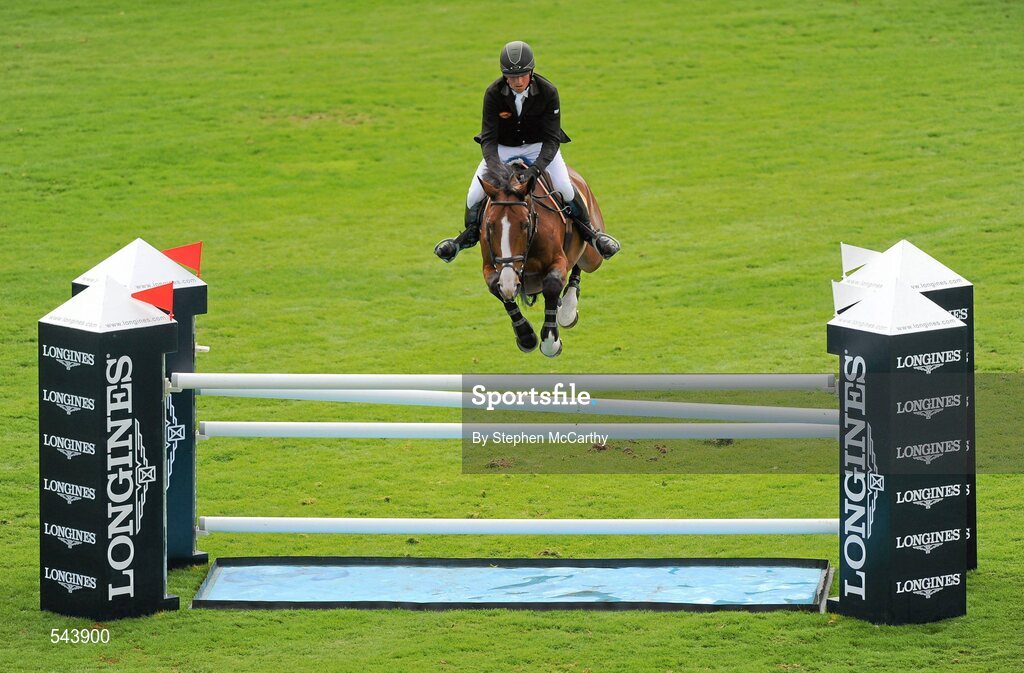 4 August 2011; Trevor Breen, Ireland, competing on  Andino Z, during the Power & Speed Event. Dublin Horse Show 2011, RDS, Ballsbridge, Dublin. Picture credit: Stephen McCarthy / SPORTSFILE