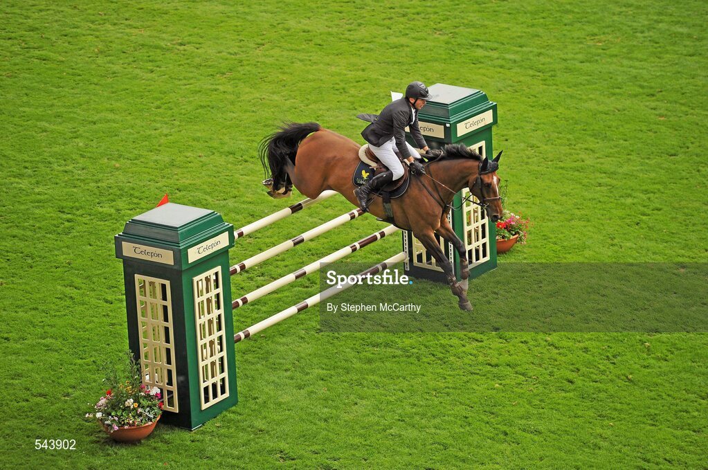 4 August 2011; Dermott Lennon, Ireland, competing on  Vampire, during the Power & Speed Event. Dublin Horse Show 2011, RDS, Ballsbridge, Dublin. Picture credit: Stephen McCarthy / SPORTSFILE