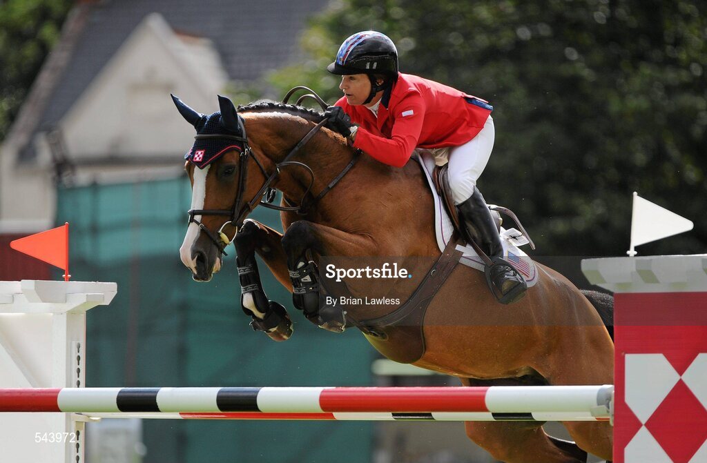 4 August 2011; Laura Kraut, USA, competing on Dona Evita, on her way to winning the Power & Speed Event. Dublin Horse Show 2011, RDS, Ballsbridge, Dublin. Picture credit: Brian Lawless / SPORTSFILE