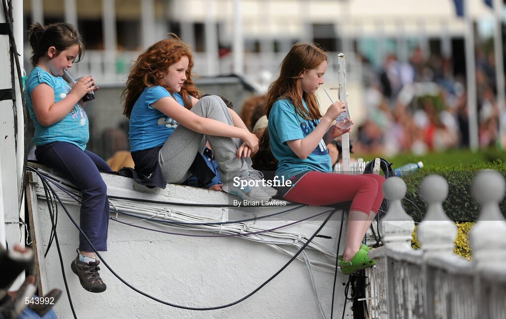 4 August 2011; Young ladies watch on during the Power & Speed Event. Dublin Horse Show 2011, RDS, Ballsbridge, Dublin. Picture credit: Brian Lawless / SPORTSFILE