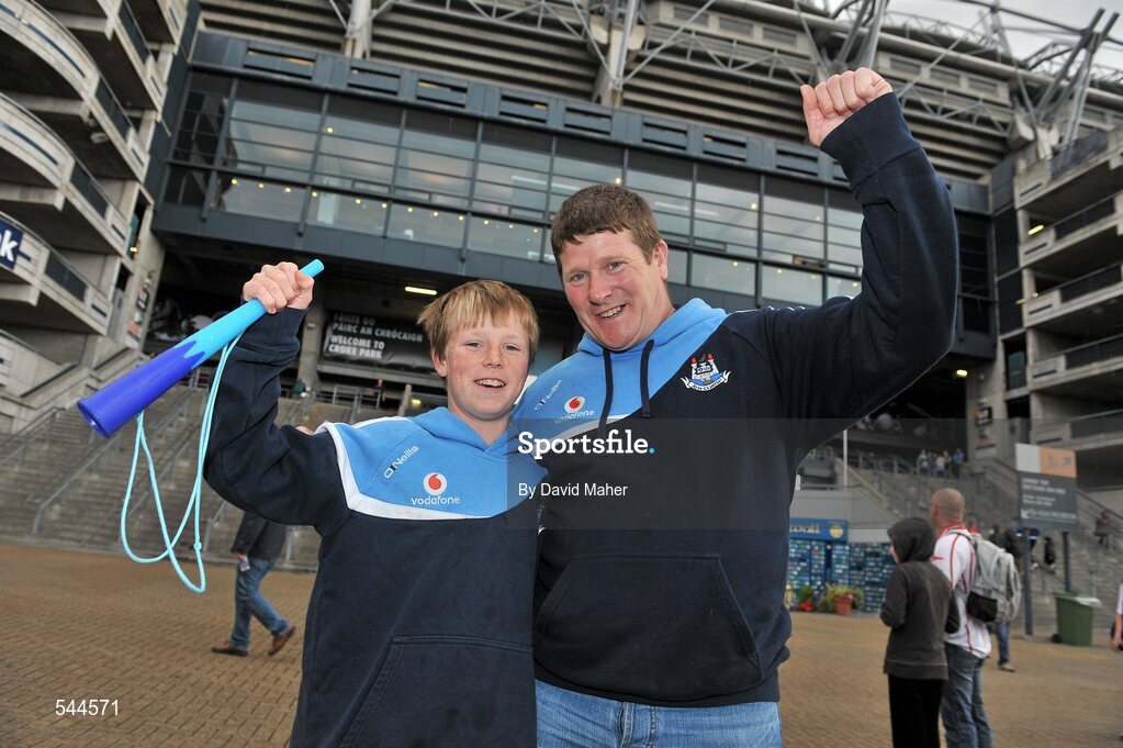 6 August 2011; Dublin supporters Peter Kelly and his son Daniel, age 13, from Clondalkin, Co. Dublin, cheer on their side before the GAA Football All-Ireland Senior Championship Quarter-Final, Dublin v Tyrone, Croke Park, Dublin. Picture credit: David Maher / SPORTSFILE