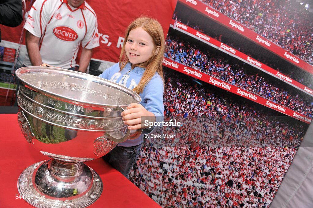 6 August 2011; Tyrone supporter Ava Kennan pictured with the Sam Maguire before the GAA Football All-Ireland Senior Championship Quarter-Final, Dublin v Tyrone, Croke Park, Dublin. Picture credit: David Maher / SPORTSFILE