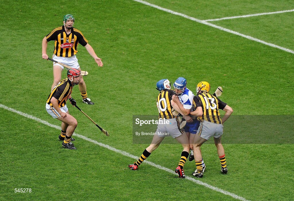 7 August 2011; Liam Lawlor, Waterford, has his route blocked by Kilkenny's TJ Reid and Colin Fennelly as Eoin Larkin and Henry Shefflin look on. GAA Hurling All-Ireland Senior Championship Semi-Final, Kilkenny v Waterford, Croke Park, Dublin. Picture credit: Brendan Moran / SPORTSFILE