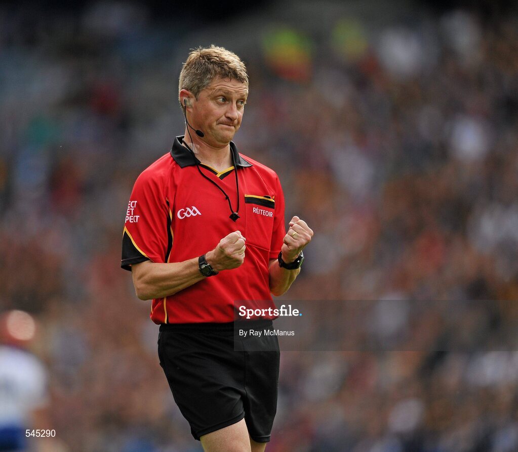 7 August 2011; Referee Barry Kelly indicates 'holding' as he cautions Waterford's Darragh Fives. GAA Hurling All-Ireland Senior Championship Semi-Final, Kilkenny v Waterford, Croke Park, Dublin. Picture credit: Ray McManus / SPORTSFILE