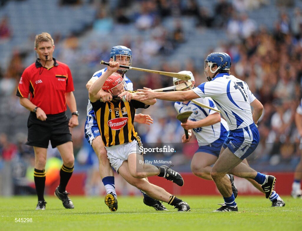 7 August 2011; Tommy Walsh, Kilkenny,  prepares to clear under pressure from Waterfotd players Michael Walsh and Jamie Nagle. GAA Hurling All-Ireland Senior Championship Semi-Final, Kilkenny v Waterford, Croke Park, Dublin. Picture credit: Ray McManus / SPORTSFILE