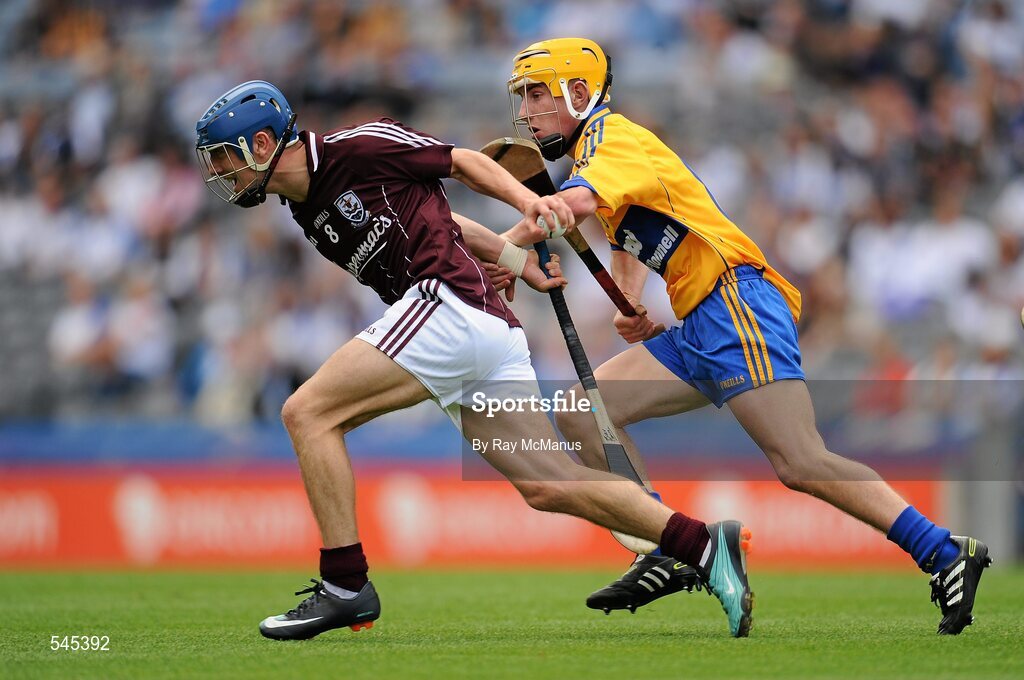 7 August 2011; Billy Lane, Galway, in action against Colm Galvin, Clare. GAA Hurling All-Ireland Minor Championship Semi-Final, Clare v Galway, Croke Park, Dublin. Picture credit: Ray McManus / SPORTSFILE