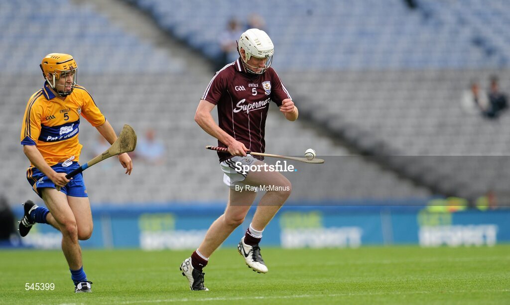 7 August 2011; John Hanbary, Galway, in action against Jarlath Colleran, Clare. GAA Hurling All-Ireland Minor Championship Semi-Final, Clare v Galway, Croke Park, Dublin. Picture credit: Ray McManus / SPORTSFILE