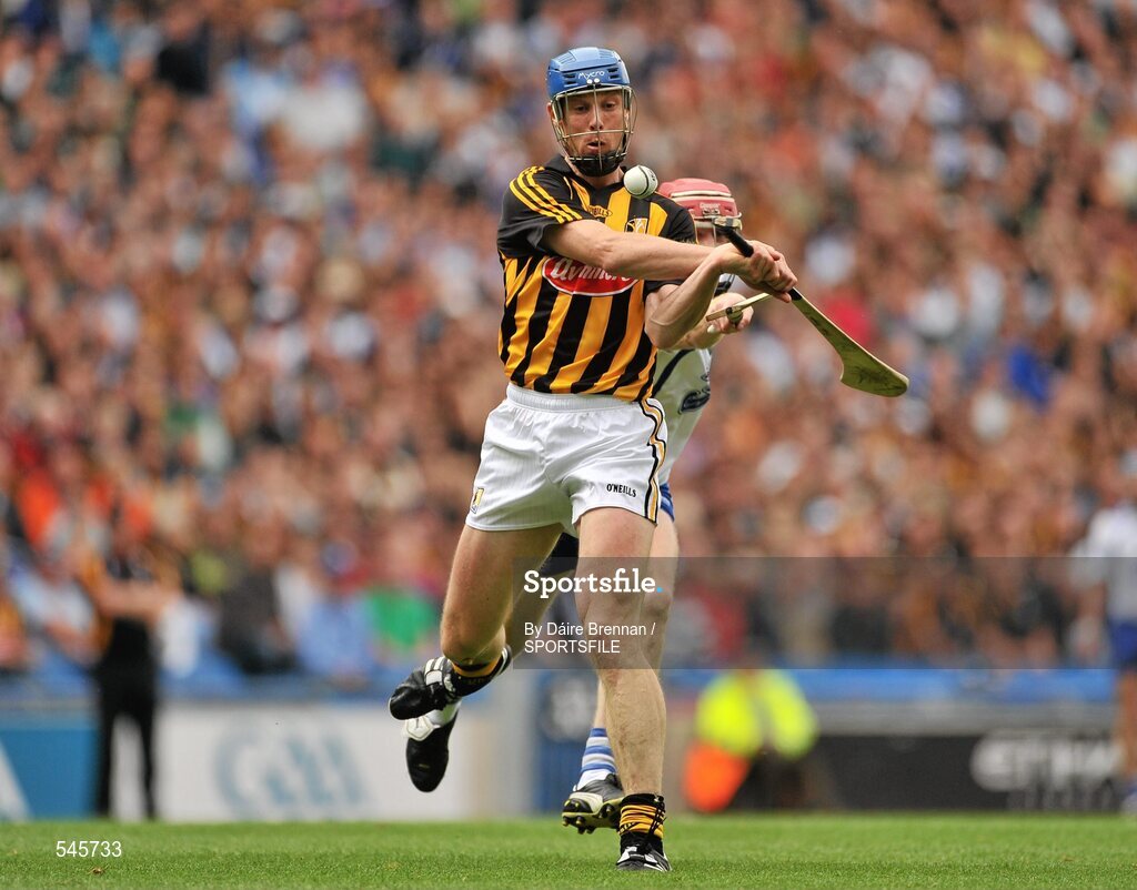 7 August 2011; Brian Hogan, Kilkenny, gets his shot away despite the effort of John Mullane, Waterford. GAA Hurling All-Ireland Senior Championship Semi-Final, Kilkenny v Waterford, Croke Park, Dublin. Picture credit: Daire Brennan / SPORTSFILE