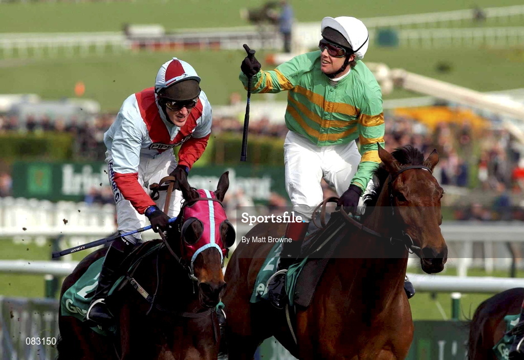 12 March 2002; Like a Butterfly with Charlie Swan up, right, crosses the line to win ahead of Westender with Tony McCoy up during Day One of the Cheltenham Racing Festival at Prestbury Park in Cheltenham, England. Photo by Matt Browne/Sportsfile