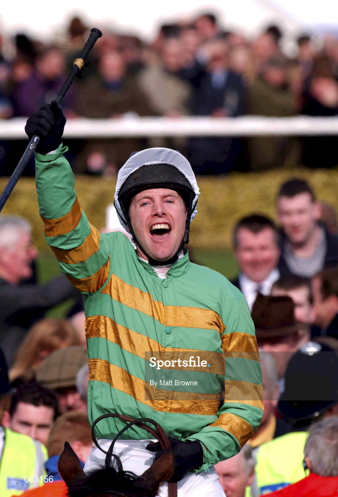 12 March 2002; Charlie Swan celebrates as he enters the winners enclosure on Like A Butterfly after winning The Gerrard Supreme Novices' Hurdle Race during Day One of the Cheltenham Racing Festival at Prestbury Park in Cheltenham, England. Photo by Matt Browne/Sportsfile