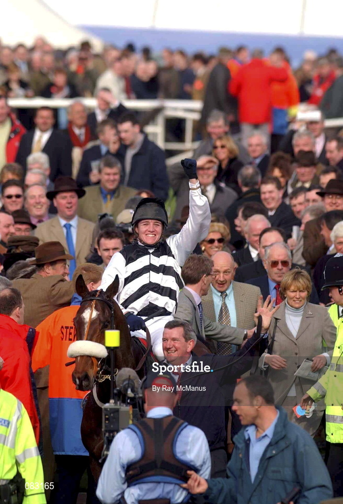 12 March 2002; Barry Geraghty celebrates winning the Irish Independent Arkle Challenge Trophy Steeple Chase on Moscow Flyer during Day One of the Cheltenham Racing Festival at Prestbury Park in Cheltenham, England. Photo by Ray McManus/Sportsfile