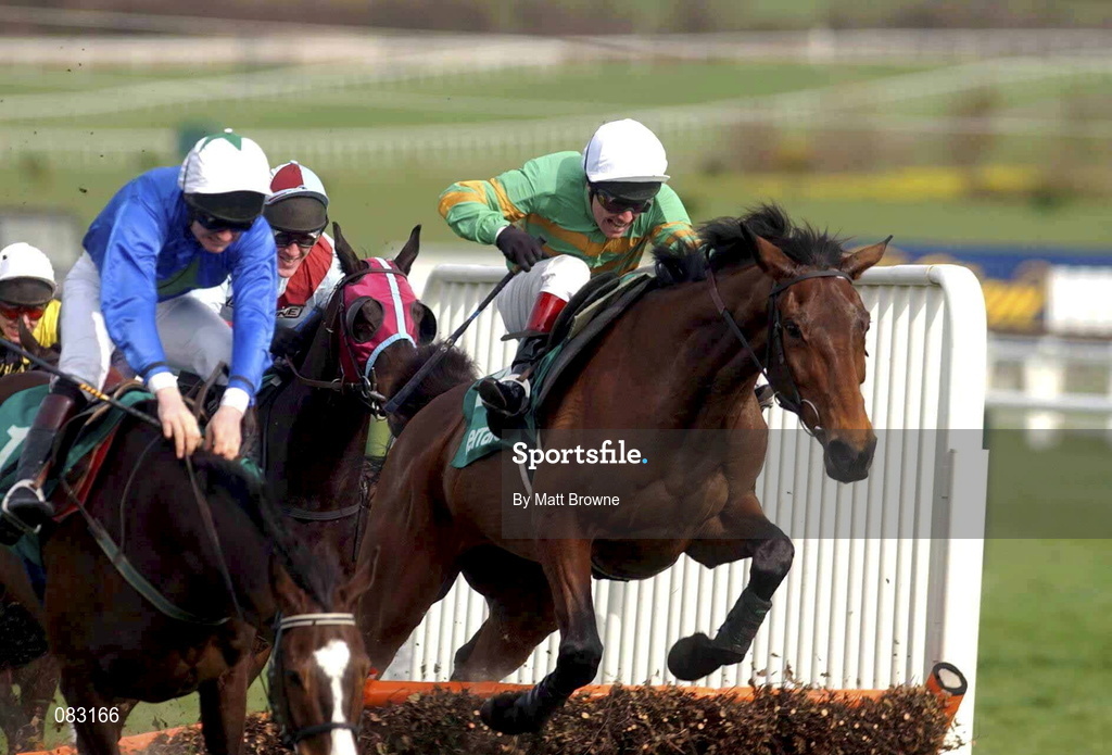 12 March 2002; Like-A-Butterfly with Charlie Swan, right, up jumps the last to on their way win the Gerrard Supreme Novices Hurdle Race during Day One of the Cheltenham Racing Festival at Prestbury Park in Cheltenham, England. Photo by Matt Browne/Sportsfile