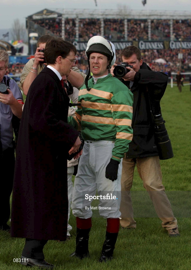 12 March 2002; Istabraq with jockey Charlie Swan and trainer Aiden O'Brien after pulling up in The Smurfit Champion Hurdle Challenge Trophy during Day One of the Cheltenham Racing Festival at Prestbury Park in Cheltenham, England. Photo by Matt Browne/Sportsfile