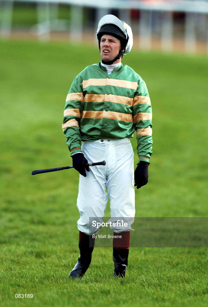 12 March 2002; Istabraq with jockey Charlie Swan after pulling up in The Smurfit Champion Hurdle Challenge Trophy during Day One of the Cheltenham Racing Festival at Prestbury Park in Cheltenham, England. Photo by Matt Browne/Sportsfile