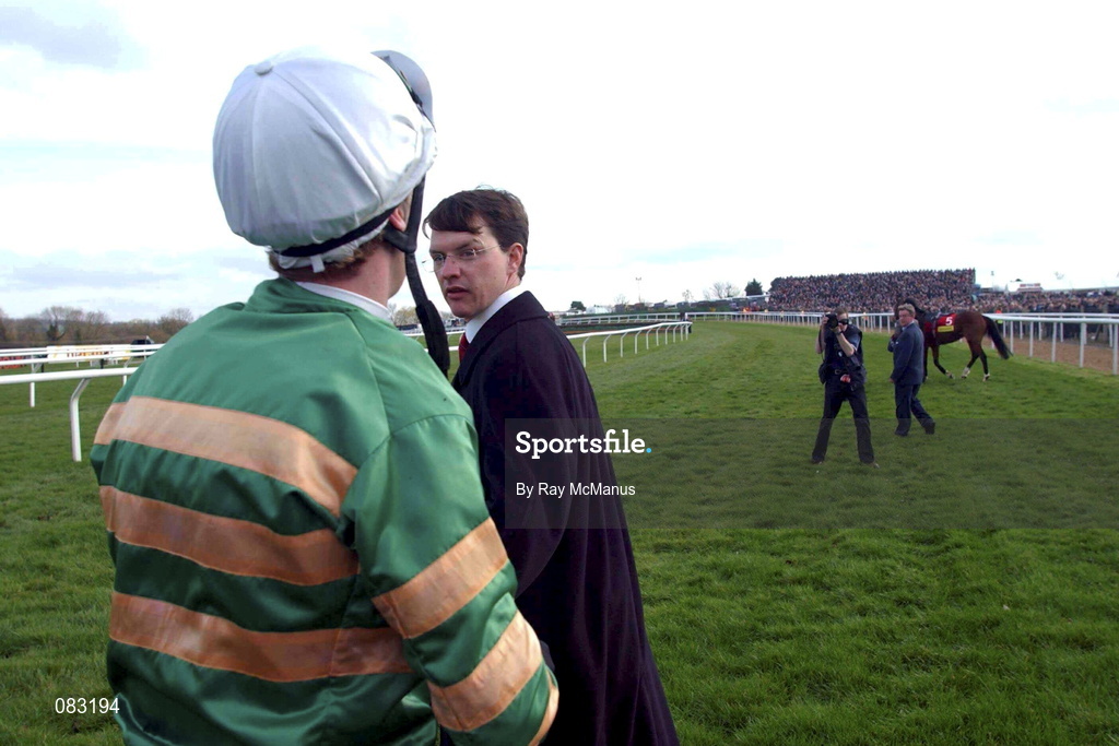 12 March 2002; Charlie Swan talking to trainer Aidan O'Brien after he had pulled up Istabraq in the Champion Hurdle during Day One of the Cheltenham Racing Festival at Prestbury Park in Cheltenham, England. Photo by Ray McManus/Sportsfile