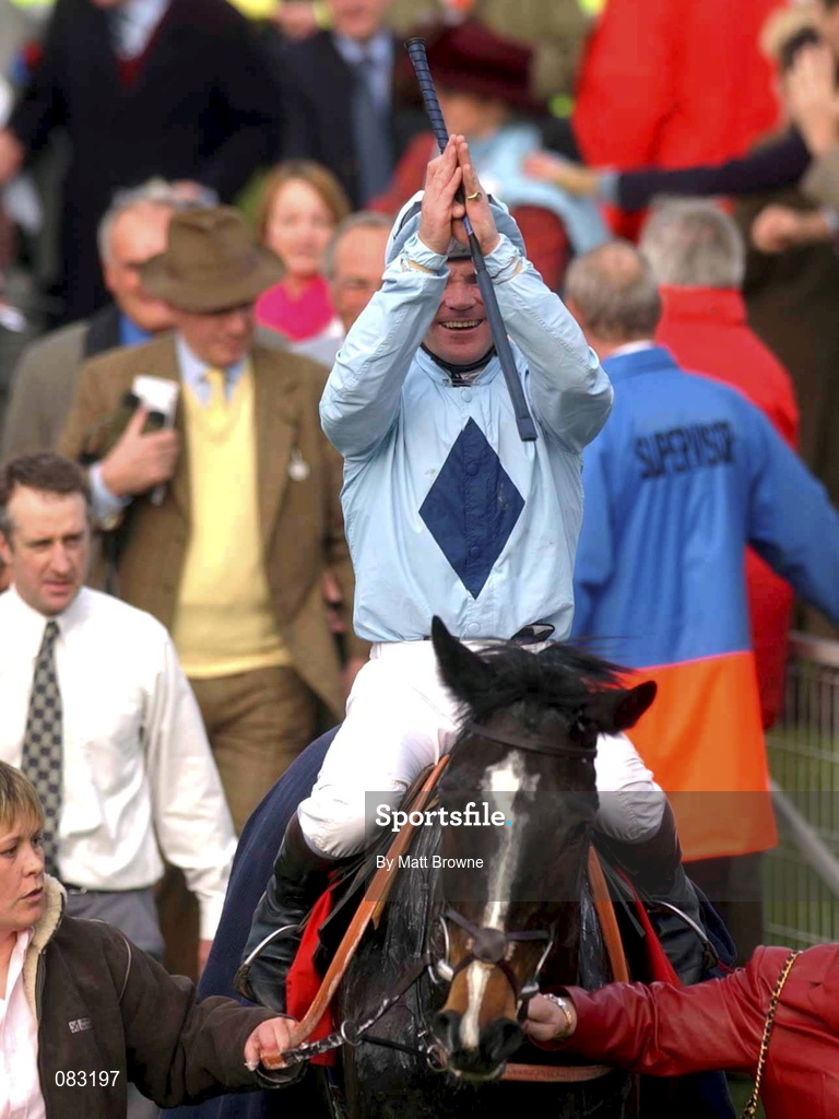 12 March 2002; Dean Gallagher celebrates after winning the Smurfit Champion Hurdle Challenge Trophy on Hors La Loi during Day One of the Cheltenham Racing Festival at Prestbury Park in Cheltenham, England. Photo by Matt Browne/Sportsfile