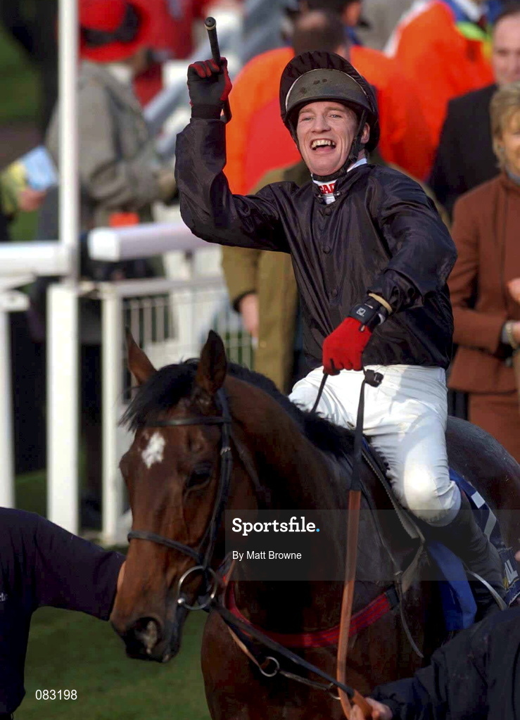12 March 2002; Paul Carberry celebrates winning the Fulke Walwyn Kim Muir Challenge Cup Handicap Steeple Chase on frenchman's Creek during Day One of the Cheltenham Racing Festival at Prestbury Park in Cheltenham, England. Photo by Matt Browne/Sportsfile