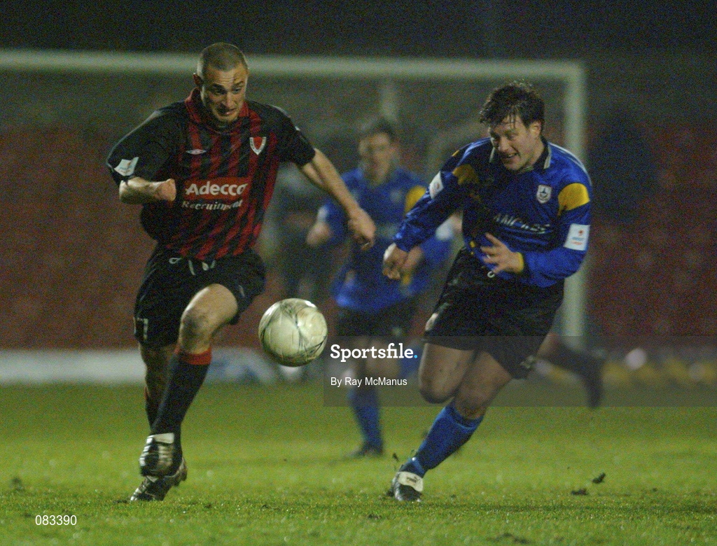 15 March 2002; Dave Morrison of Bohemians in action against  Wesley Burn of Longford Town during the Eircom League Premier Division match between Bohemians and Longford Town at Dalymount Park in Dublin. Photo by Ray McManus/Sportsfile